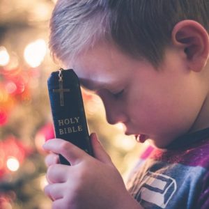 A child prays Lectio Divina.