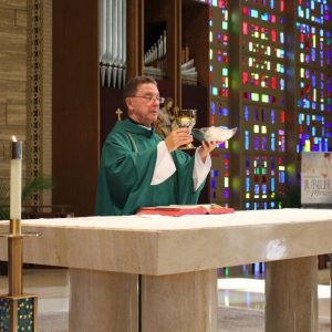 A Catholic priest performing the mass.