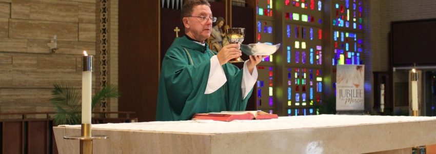 A Catholic priest performing the mass.