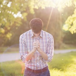 A jobseeker praying to find employment.