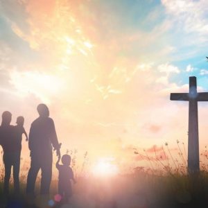 A Catholic family pursuing God and looking at the cross.