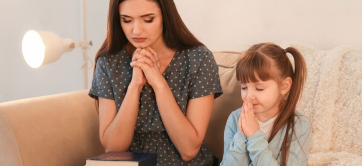 A mother teaching her daughter how to pray is one sign that she is a spiritual mother.