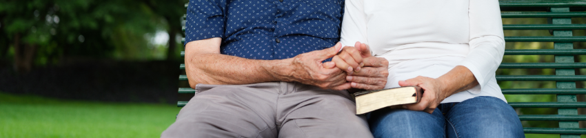 Married sitting at the church and doing prayers to their relationship