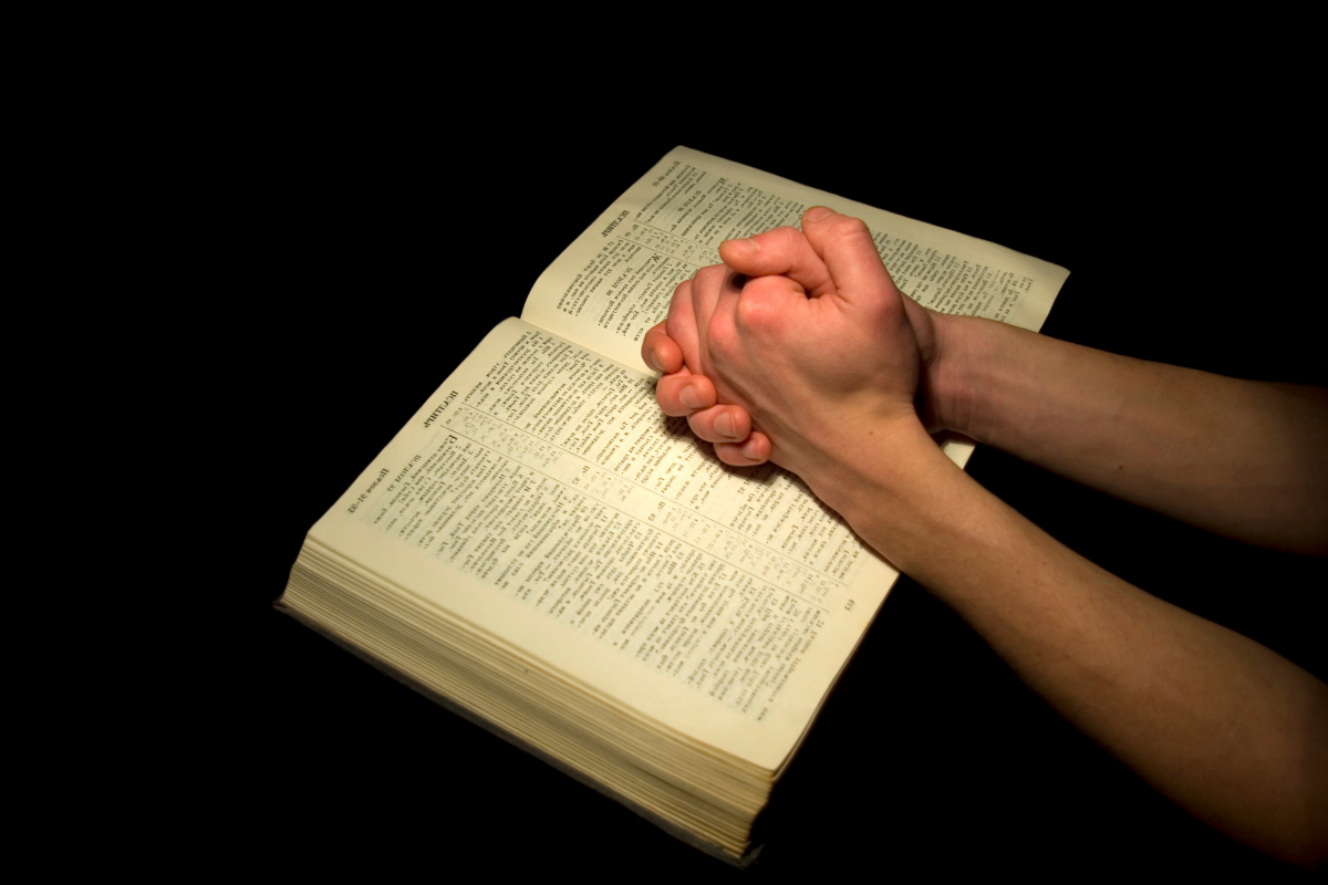 Human hands showing encourage to bible verses to increase his or her self control