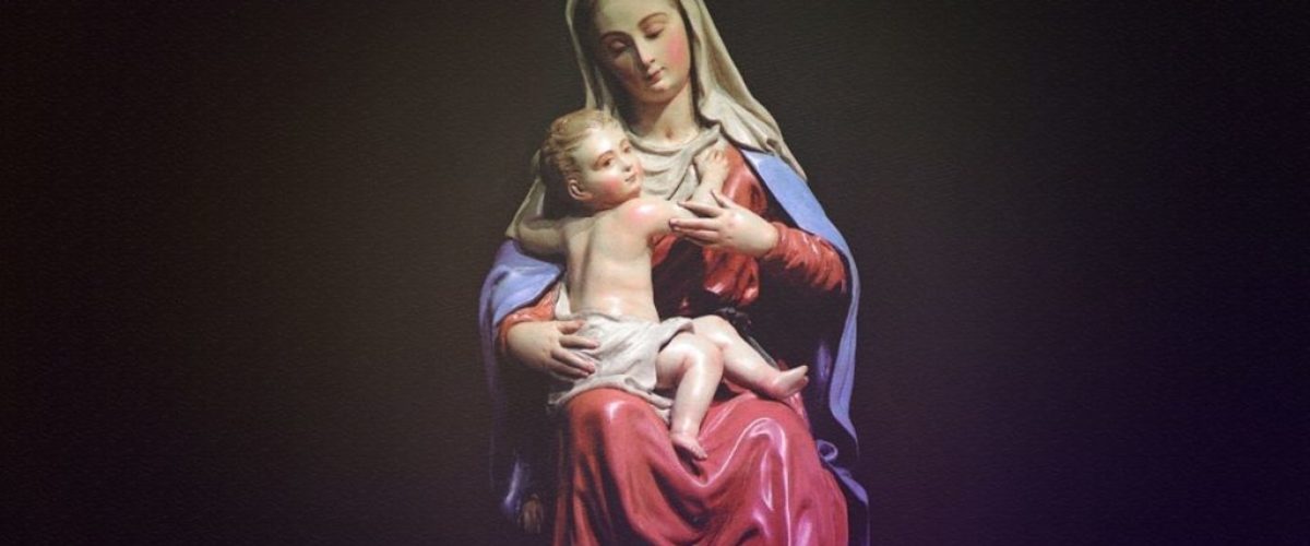 A statue of Mother Mary holding the baby Jesus.