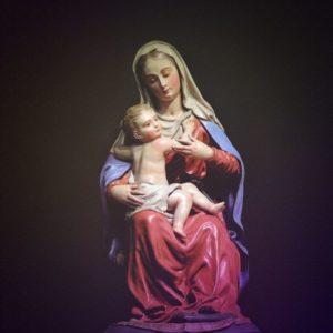 A statue of Mother Mary holding the baby Jesus.