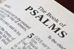 Open Bible showing The Book of Psalms, illustrating popular psalm verses in the Bible.