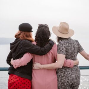 Three friends looking at the horizon.