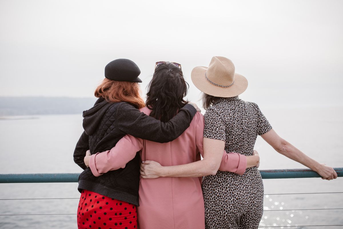 Three friends looking at the horizon.