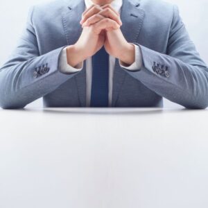 The CEO prays for the success of his business.