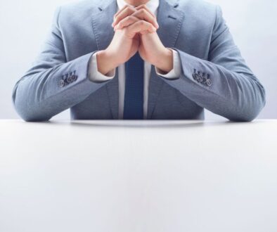 The CEO prays for the success of his business.