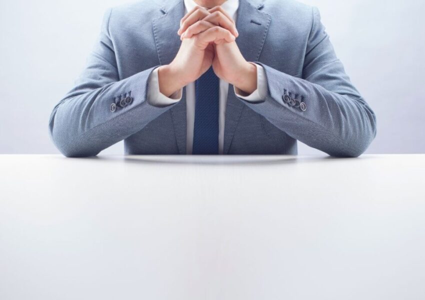 The CEO prays for the success of his business.