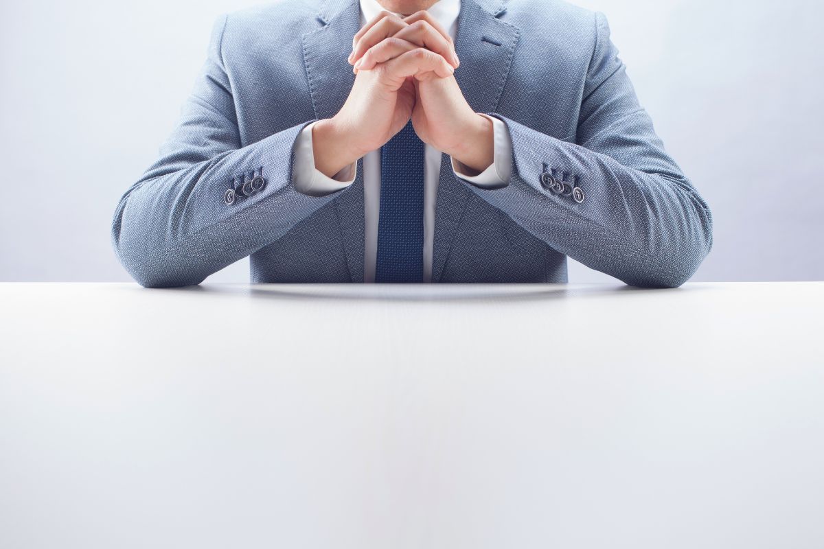 The CEO prays for the success of his business.
