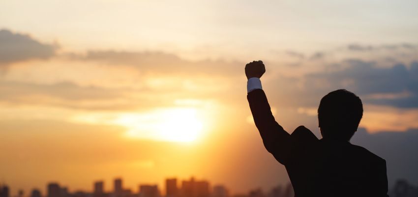 The CEO is happy with the success of his business.