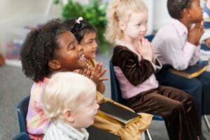 The kids enjoy hearing about the lives of Catholic saints they see as role models.