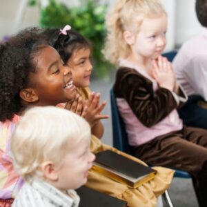 The kids enjoy hearing about the lives of Catholic saints they see as role models.