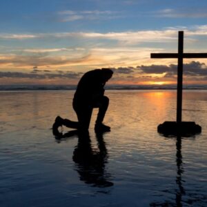 The man prays after he reads about humility in the bible verses.