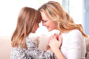 Mother and daughter are happy when they read bible verses about mother and daughter.