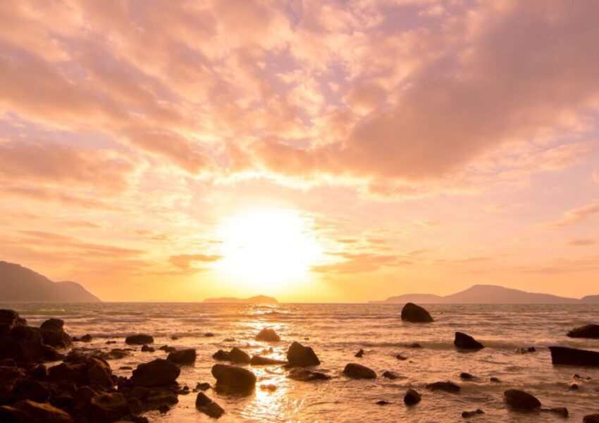 bible verse about sunsets (3) A view of the sunset on the beach.