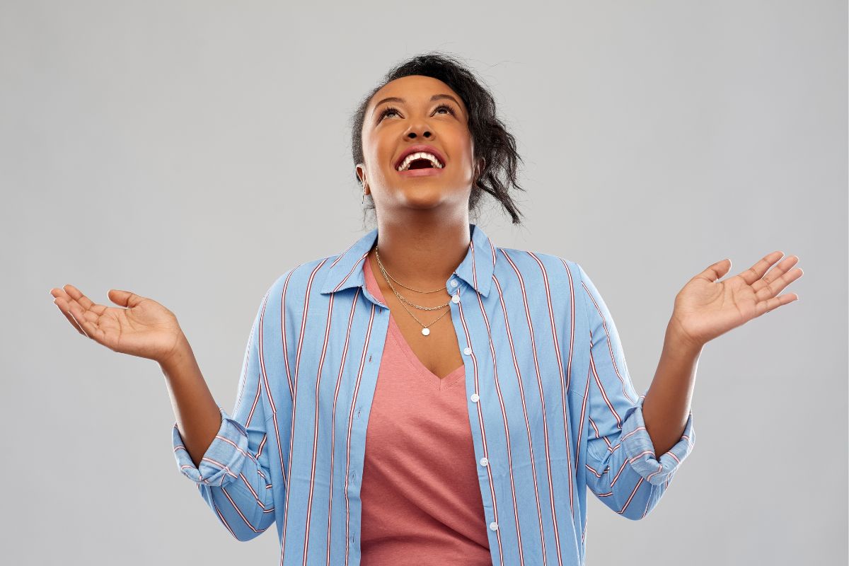 The woman is happy after reading about count your blessing and thankful bible verses.