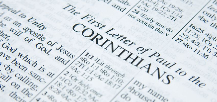 A woman wearing a white church veil.