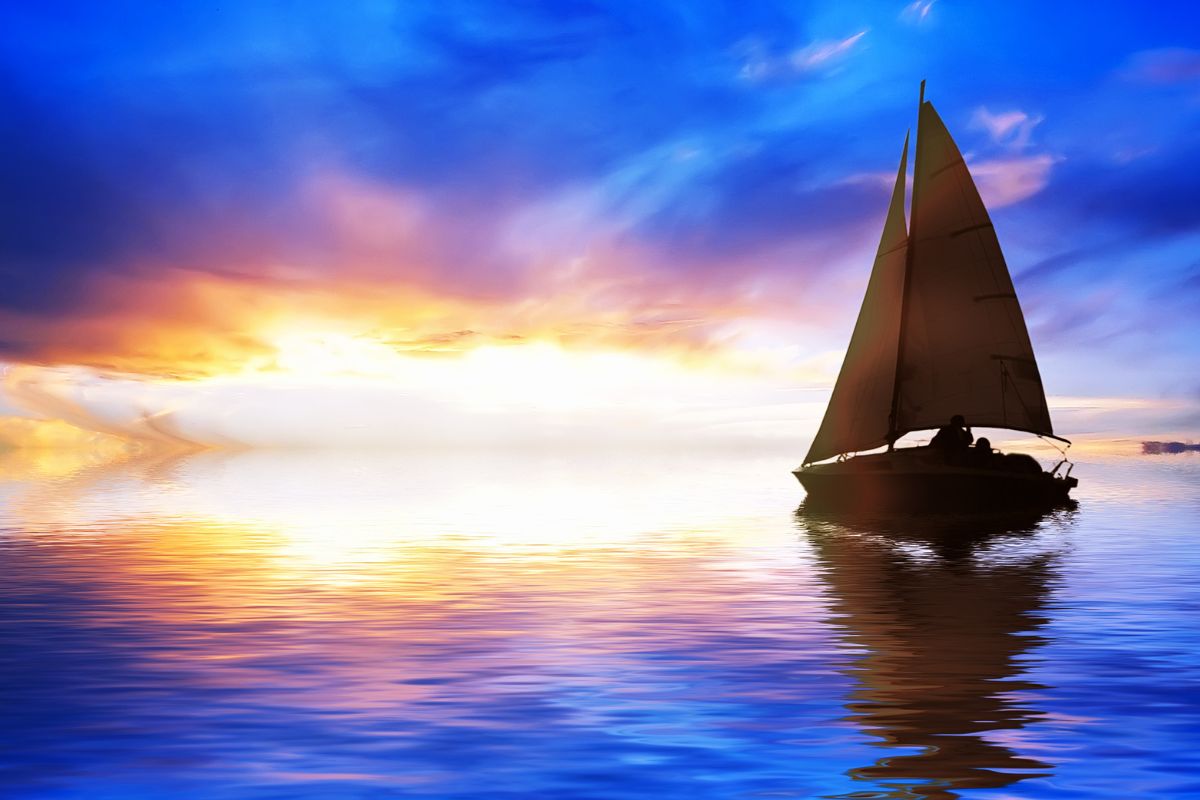 The sailor sails alone across the ocean.
