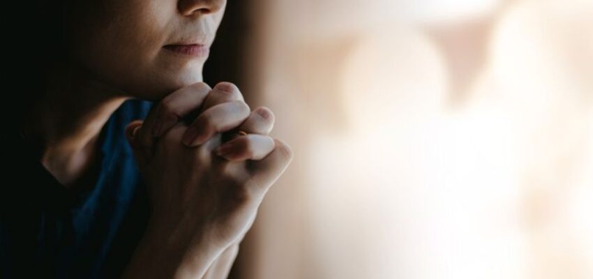 The woman was praying fervently.