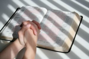 The person prays to God for protection from evil.