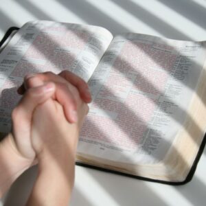 The person prays to God for protection from evil.