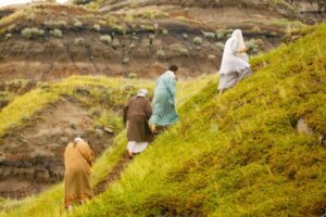 Followers of Jesus up a mountain.