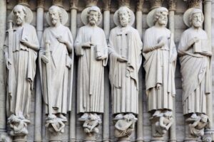 Stone statues of apostles and saints showcasing classic catholic saints names in architecture