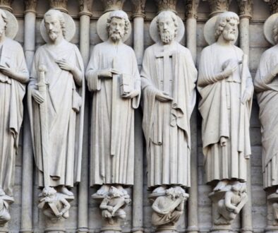 Stone statues of apostles and saints showcasing classic catholic saints names in architecture