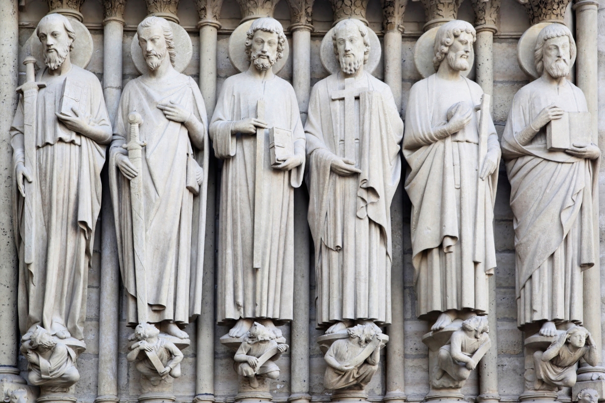 Stone statues of apostles and saints showcasing classic catholic saints names in architecture