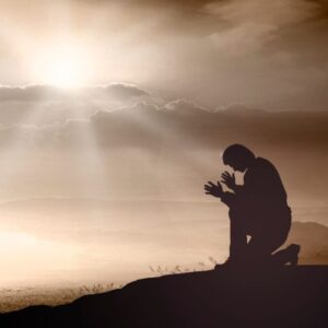 A man is praying for repentance and forgiveness.