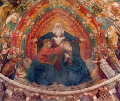 A mural depicting the Holy Trinity on the ceiling of a church.