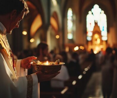 A Catholic priest prepares to give out communion.