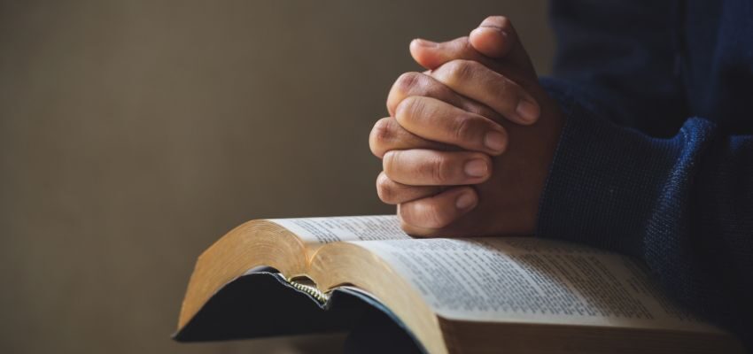 The man prays about anxiety after reading the scriptures.