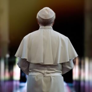 The pope walks through a church.