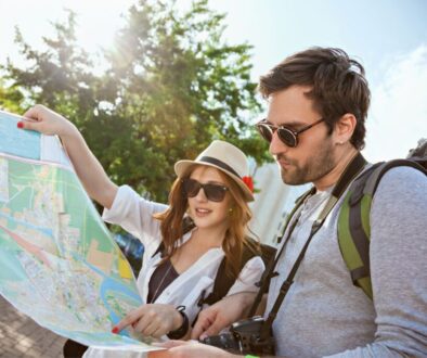 Tourists look at a map.