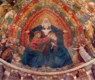 The Holy Trinity of Father, Son, and Holy Spirit is painted on a church ceiling.
