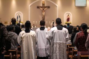 A Catholic church full of people.