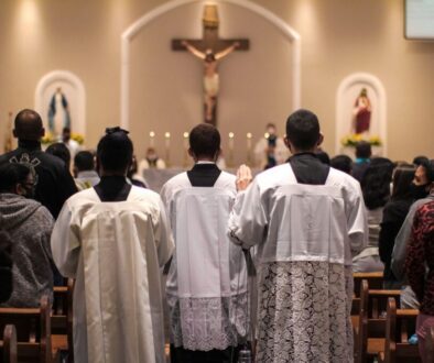 A Catholic church full of people.