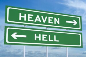Highway signs showing the way to heaven or hell.