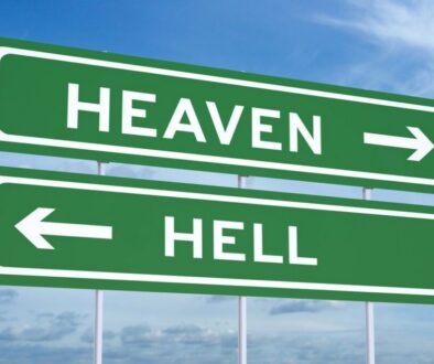 Highway signs showing the way to heaven or hell.